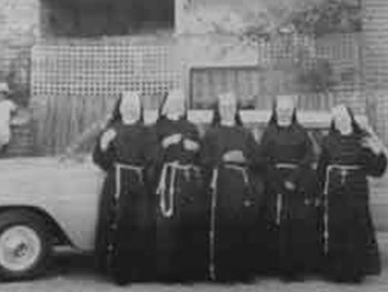 Historical Photo of Sisters at St Monica's with their first car